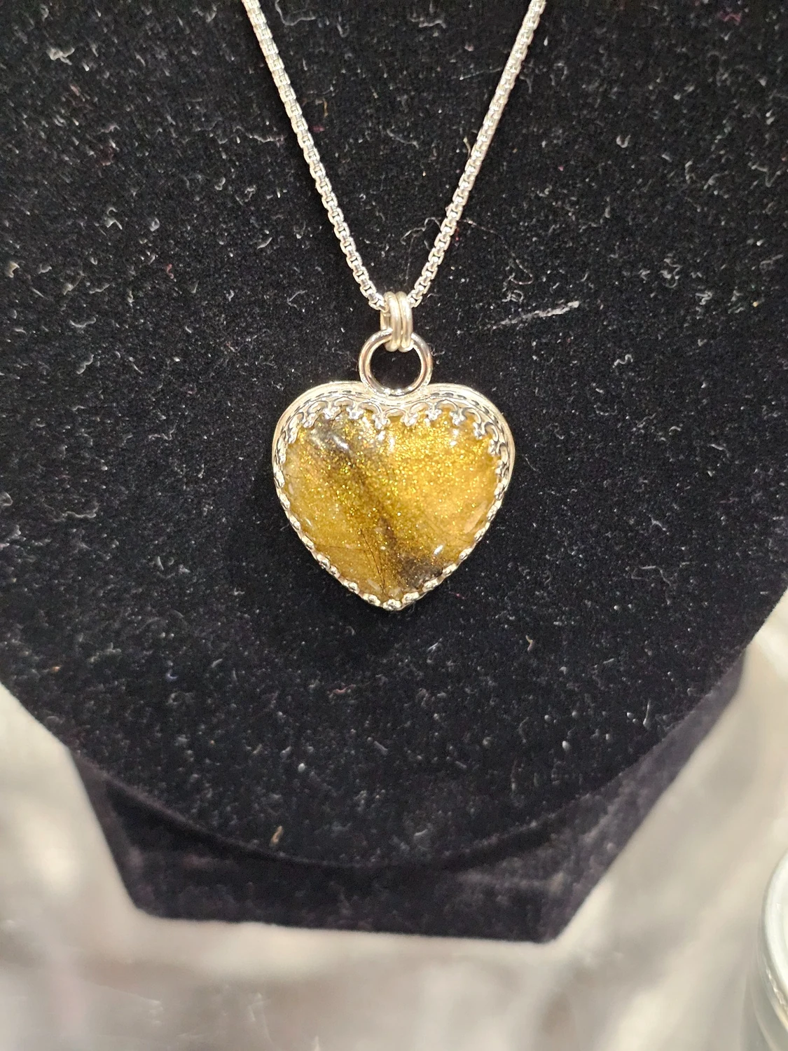 Handmade sterling silver heart keepsake pendant